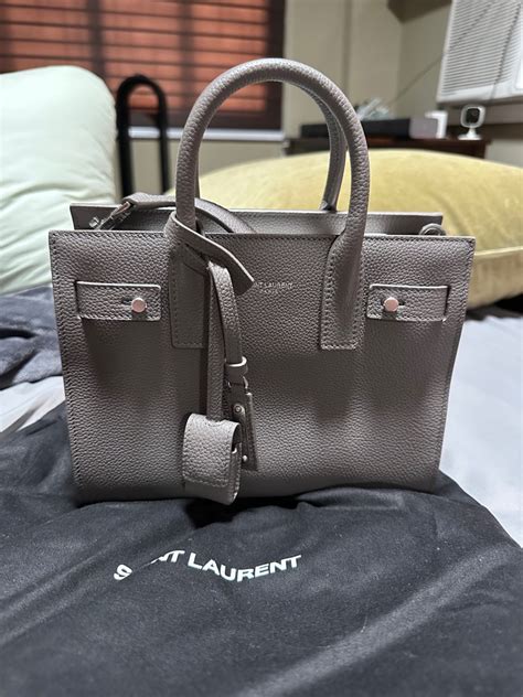 spot fake saint laurent bag|saint laurent bag serial number.